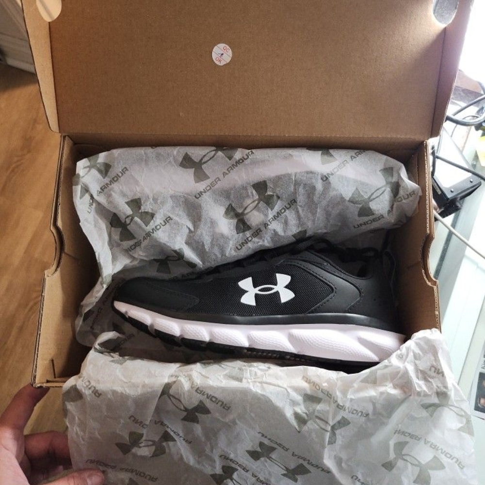 Under Armour Black and White Athletic Shoes with Classic Design